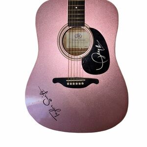 Signature Pink Acoust guitar signed by Taylor swift